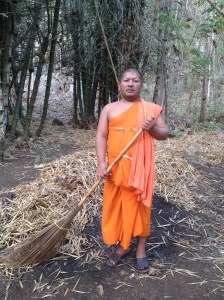 Late afternoon, I found this monk was sweeping in the Mon village along the River Kwai