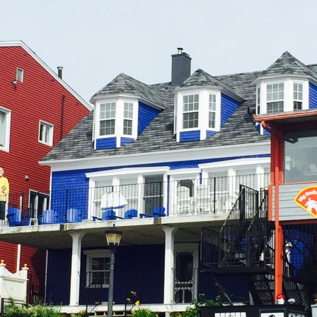 While this house was as blue as the waters on which it was perched