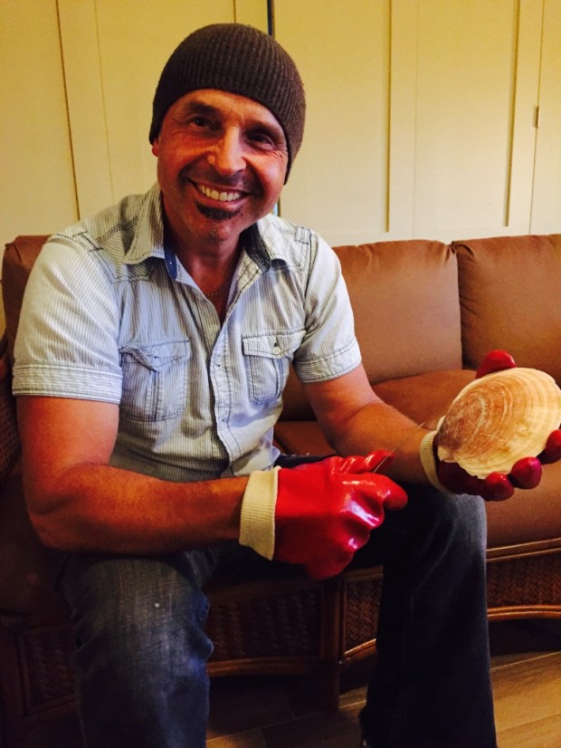 Brad is not only extremely good looking, but he also catches scallops. (Did I mention that Brad is good looking?)